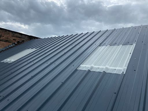 Asbestos Roof Renewal — Customer photo