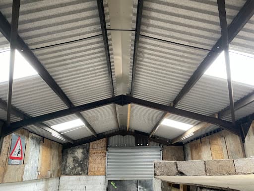 Asbestos Roof Renewal — Customer photo