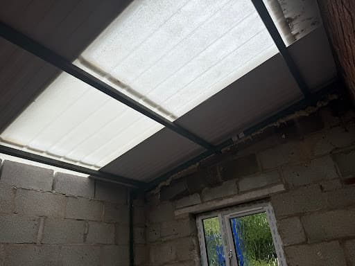 Asbestos Roof Renewal — Customer photo